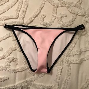 Pink bikini bottom with black outlining
